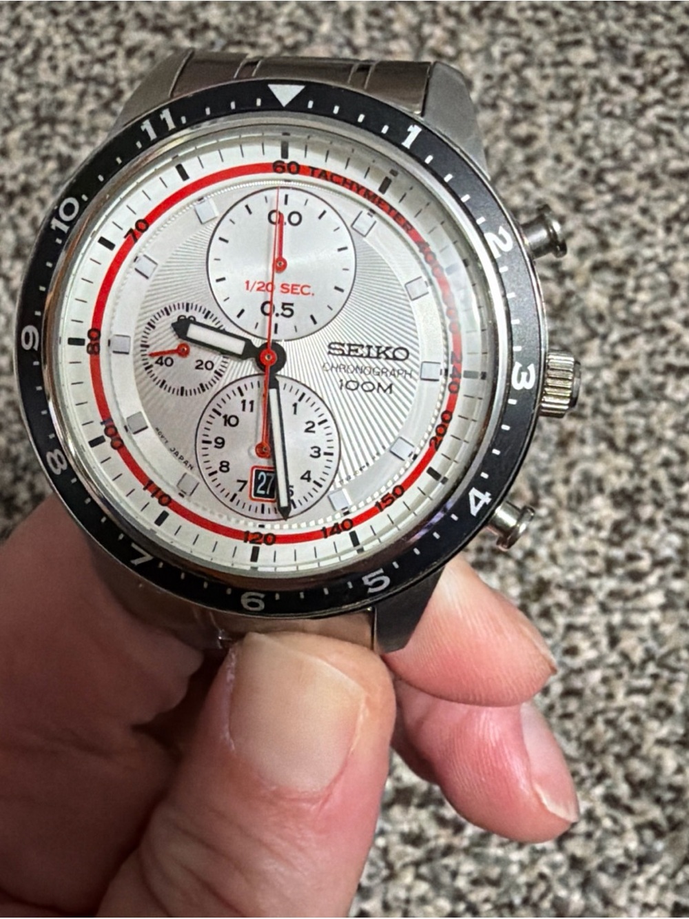 Seiko Silver Watch with White Dial and Red Accents